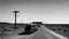 Placeholder: he essence of a modern beatnik road trip from the East Coast to the West Coast, inspired by the themes of William S. Burroughs' "The Electronic Revolution" and Jack Kerouac's "On the Road." The images should blend the restless spirit of the beat generation with the digital age, highlighting the tension between authentic experiences and the manipulative power of electronic media.
