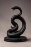 Placeholder: an ominous small statuette made of ebony in the form of a mountain encircled by a snake