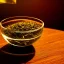 Placeholder: cinematic shot of tea leaves inside a glass bowl, glass, crystal, dewdrops, warm lighting, soft lighting, sunbeam, linen