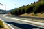 Placeholder: blank billboard, on a Spanish highway, cars driving on the road, front view, real photography, 16K