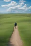 Placeholder: A man walks on a path surrounded by green land and a beautiful blue sky