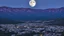 Placeholder: full moon over the valley