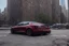 Placeholder: A Tesla 'Model S' is parked, near the Flatiron Building in Manhattan. (CINEMATIC, WIDE ANGLE LENS, PHOTO REAL)