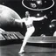 Placeholder: Ice-T as a classical dancer in space, vintage 1970's photo