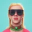 Placeholder: portrait of a teenager girl with curly blonde hair and green eyes wearing sunglasses and chewing a bubble gum