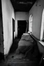 Placeholder: dirty creepy place, organic matter is everywhere, dirty sheets and burnt plastic