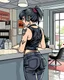 Placeholder: tank-girl punk emo girl hands on counter and leaning backward away from a reception desk, side view, american comicbook