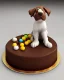 Placeholder: Dog model made of chocolate cake with Maltesers