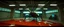 Placeholder: car insect in the style of Escher and Giger and Fallout 4, pinhole cam, airbrush 3d rendering, on tv screen:A five-second cinematic single take in a clean industrial presentation hall.