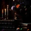 Placeholder: rave on books with flowers and lit candles dark moody art with browns green earthy tones, deep purples, hyper realistic maximalist concept art