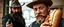 Placeholder: mean looking amish macho mafia thug with hot dog duell