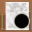 Placeholder: A High resolution photograph with soft lightning, of a a4 size drawing on a table next to two colored pencils. A green plant in a pot in the left top corner, a cup of coffee in the right top corner.