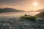 Placeholder: highly detailed glacial lake landscape, sunset, cinematic lighting, 4k, 8k, octane render, trending on 500px, pinterest, extremely detailed, ambient lighting, single frame, tiny kayak on pebble beach in foreground