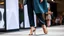 Placeholder: lady in fashion clothing with nice high heels in a modern fashion show