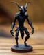 Placeholder: A photo of a tabletop role-playing miniature of a ant-human-hybrid ddmon covered in a black rubbery skin. it has a humanoid stance with two legs and four arms ending in crablike claws emerging from the torso. the miniature is full body and has a wooden base background. the miniature is inspired by the style of john howe, alan lee and the diablo franchise.