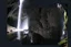 Placeholder: cliffside path winds through the mossy caves towards the light in the ceiling
