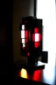 Placeholder: gaming lamp, form inspired by stark tower, architecture form, modern design style and black and red color