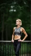 Placeholder: photography of a beautiful anorexic woman, grey satin triathlon top, sports illustrated, blond short wavy bob haircut, pronounced sternum, flat chest, anthracite cycling leggins