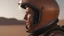 Placeholder: man with astronaut helmet close up photo realistic-cinematic, female with astronaut helmet, Eye Level Shot, menace coming, sand - storm, mars desert, peach light, movie still --ar 16:9 --style raw