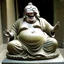 Placeholder: A statue of the laughing Buddha, a smiling face and he is rolling with laughter and sticking out his tongue