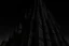 Placeholder: A twisted, dark, cathedral/tower stretching into a cracked sky