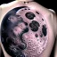 Placeholder: the moon tattoo