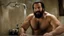 Placeholder: two ugly muscular chubby arab 40 years old similar to bud spencer, very detailed, full figure shot, very realistic photography, dim light, view from below, tiled restroom, tattoo, masculine bearded, white substance dripping from beard, with glue stuck to and dripping from beard,, , mature barely burly bearded muscled and robust