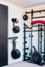 Placeholder: Home gym, wall with a kabinet with weights and small gym equipment.