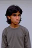 Placeholder: Appearance: Ari has a mixed-race skin tone with a light brown complexion. He has dark hair in a page boy haircut, and his hair length could be somewhere in-between long and short. His face is thin with high cheekbones and dark eyes that are often full of emotion. He stands at around 5 feet 7 inches tall, with a lean build that suggests he doesn't engage in a lot of physical activity.