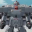 Placeholder: mecha with tracks for a tank. His body is armor and his hands are machine guns. The robot head has glass and the driver is an animal