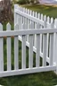 Placeholder: white vinyl fence in yard, photograph