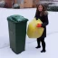 Placeholder: a lifelike picture of a women taking the rubbish out in the snow