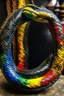 Placeholder: ouroboros made of paint, leather background