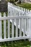 Placeholder: white vinyl fence in yard, photograph