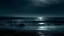 Placeholder: a dimly lit beach. A beautiful painting by Chris Friel captures the moody tonalism of the scene, with a foreboding sea tormenting the shores. The dark, misty atmosphere and dark blue mist add to the mystique of the black-water background.