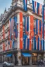 Placeholder: A full street in a big city with frech style building. The street is filled with blue flags