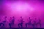 Placeholder: An orchestra playing on stage purple color scheme, high key lighting, volumetric light high details psychedelic background