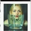 Placeholder: a young sad woman who looks like blond elle fanning, trapped in a giant glass of water where is it written "PLEASE", surreal, liminal atmosphere, polaroid