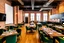 Placeholder: Image depicts a modern, spacious dining area with a contemporary style. The layout features several rectangular tables arranged in rows, each set with green velvet chairs. The tables are elegantly set with plates, cutlery, and small floral centerpieces. The room has a warm ambiance, highlighted by wooden flooring and exposed brick walls. On one side, a large flat-screen television is mounted on a white wall panel. The opposite side showcases a sleek, black kitchen area with built-in appliances a