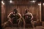 Placeholder: full body shot photography, two muscular chubby ugly burly marocan men , sweat, bulge, masculine hairy 43 year old man, curly hair, manly chest, curly beard ,big shoulders, big arms, big legs, bulge,, ambient occlusion , lying down sleeping in a steamy Sauna, super high resolution, 8k, dim light, side light, ultra hyper realistic, frontal view