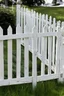 Placeholder: white fence in yard, photograph