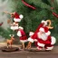 Placeholder: miniature christmas scene santa reindeer drunk