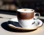 Placeholder: Cappuccino art microfoam in glass mug saucer Crawford plaid napkin Demitasse