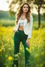 Placeholder: fullbody close up shot of young-beautiful-girl-with-a-perfect-face wearing pants and thight blouse and jacket, country side green field flowers day lights