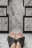 Placeholder: generate a picture of a woman's feet with marble floor as background and white nail polish