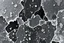 Placeholder: texture of ice crystal on flat surface, white on black vector