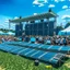 Placeholder: solar panels in a music festival