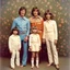 Placeholder: awkward family photo, all wearing the same type of clothes, 1970s