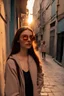 Placeholder: A selfie of a brunette student in a back alley in Istanbul at sunset wearing her own makeup, reflecting the sun in her sunglasses.