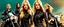 Placeholder: Poster for an action film called "The Motorbike Girls" starring Katherine McNamara, Margot Robbie and Georgia Henshaw wearing tight leather catsuits.